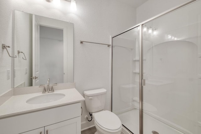 17109 Astral Ln, Manor, TX 78653 - full bathroom with a stall shower, vanity, and a textured wall