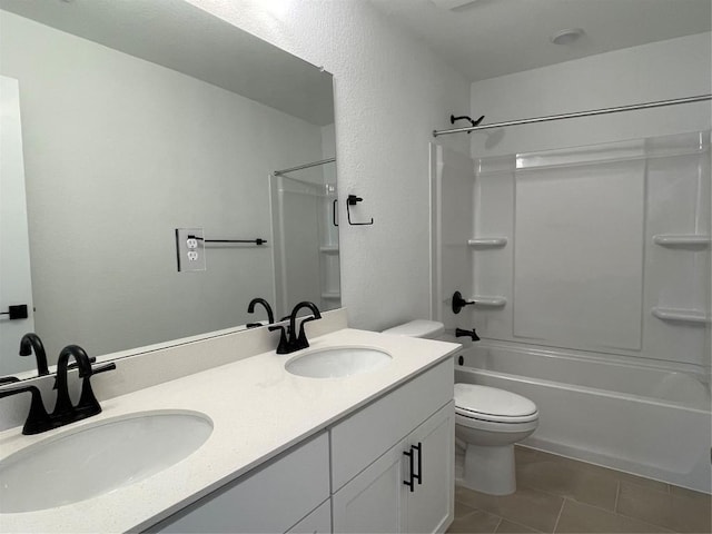 17308 Astral Ln, Manor, TX 78653 - full bath featuring double vanity, tile patterned floors, and tub / shower combination
