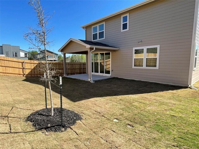 17308 Astral Ln, Manor, TX 78653 - back of property featuring a patio area