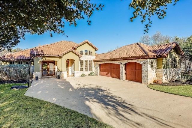 mediterranean / spanish-style home featuring a garage