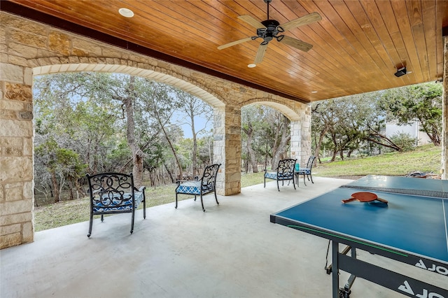 view of patio featuring ceiling fan