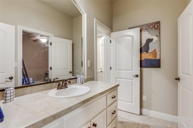 bathroom featuring vanity and tile patterned flooring