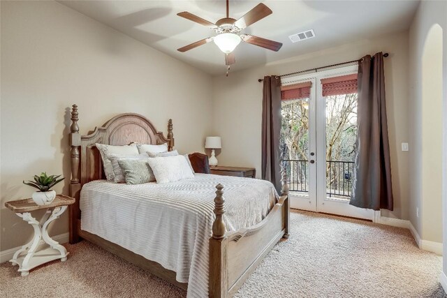 carpeted bedroom featuring access to exterior, french doors, and ceiling fan