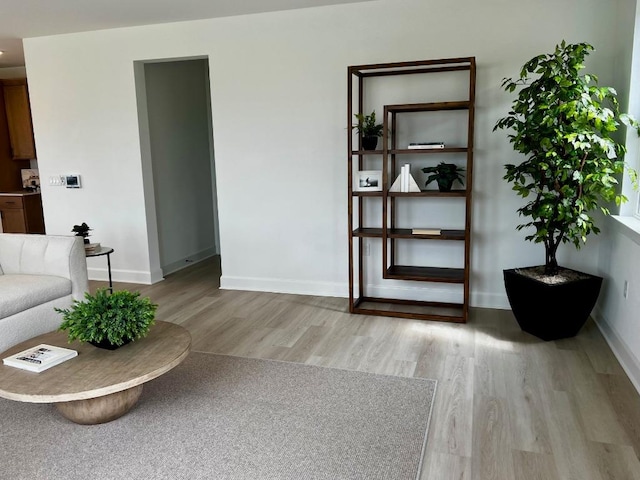 17108 Vernal Rd, Manor, TX 78653 - living room featuring light wood-type flooring and baseboards