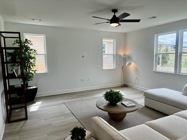 17108 Vernal Rd, Manor, TX 78653 - living room with light wood-style floors and a ceiling fan
