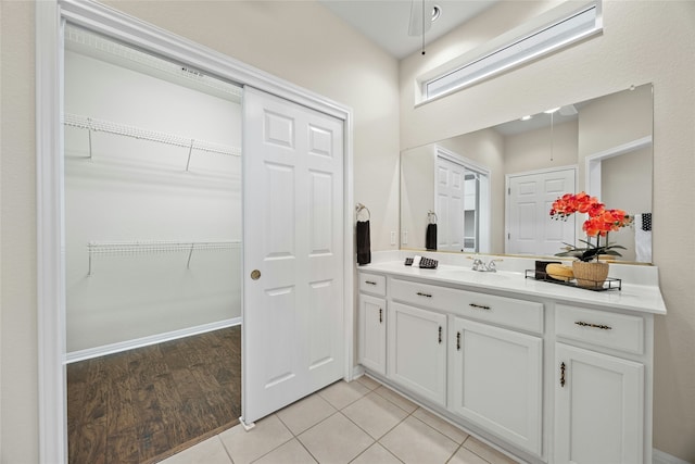 bathroom with vanity and tile patterned floors