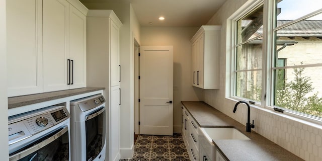 200 E Eldorado Ridge Dr, Fredericksburg, TX 78624 - laundry room featuring independent washer and dryer, cabinet space, and recessed lighting
