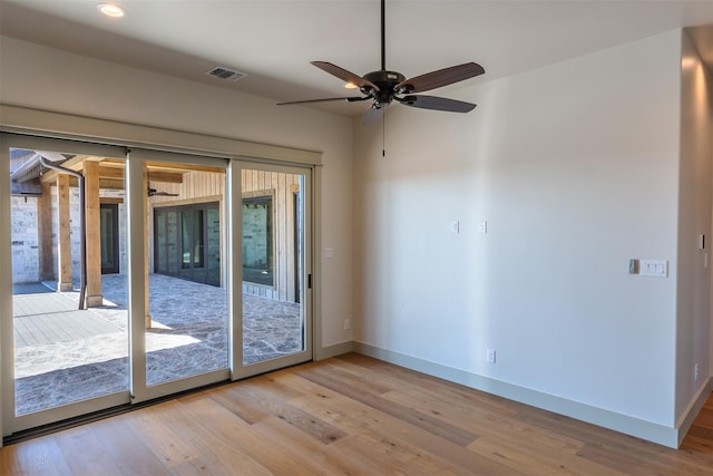 doorway to outside featuring ceiling fan and light wood-type flooring