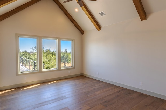 unfurnished room with ceiling fan, beamed ceiling, light hardwood / wood-style flooring, and high vaulted ceiling