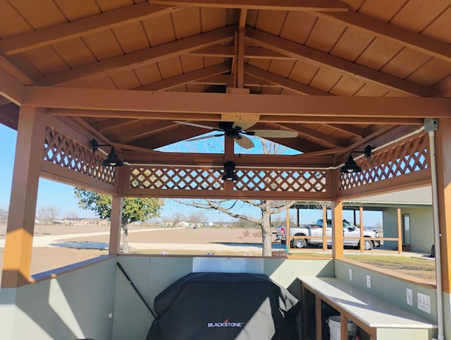 view of patio with ceiling fan and a gazebo