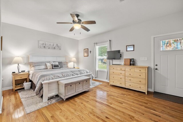 bedroom featuring ceiling fan and light hardwood / wood-style floors