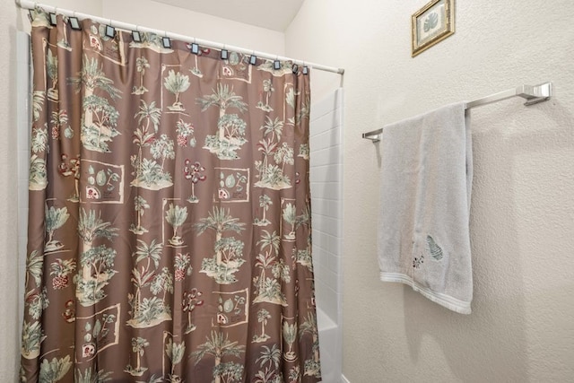 bathroom featuring shower / bath combination with curtain