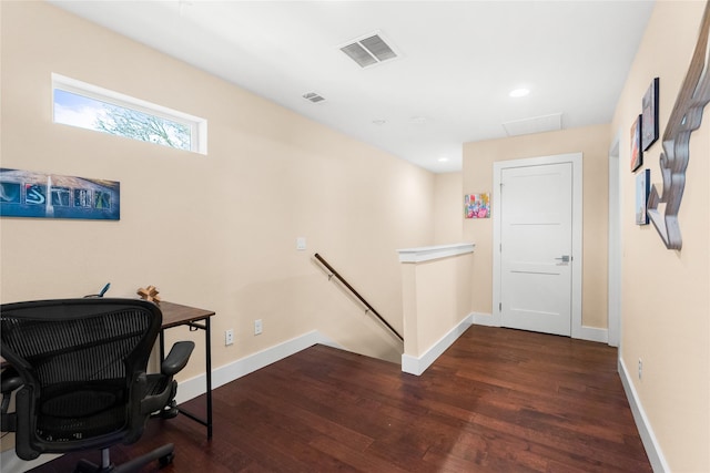 office space with dark hardwood / wood-style floors