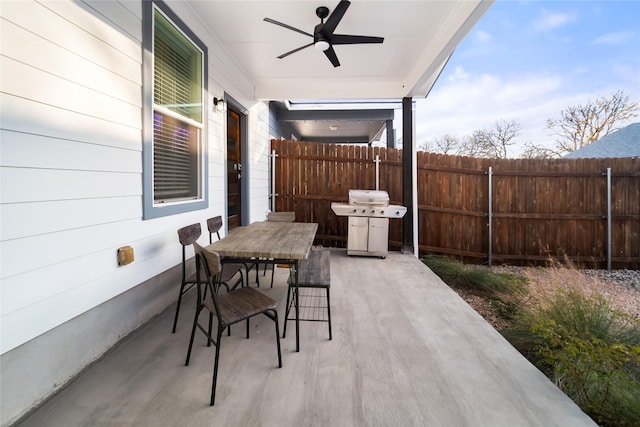 view of patio / terrace featuring ceiling fan and a grill