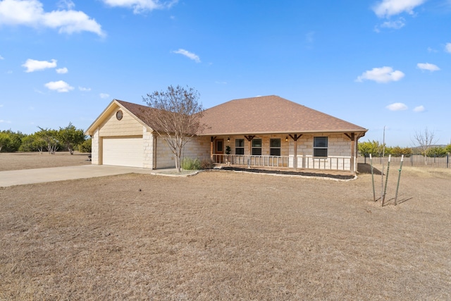 single story home with a garage and a porch