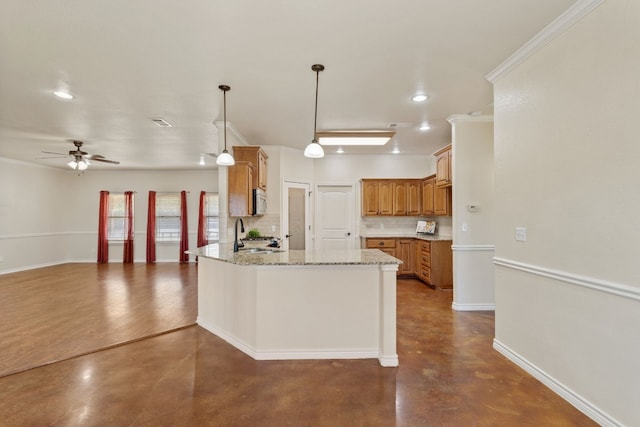 2000 County Road 116b, Burnet, TX 78611 - kitchen featuring concrete flooring, backsplash, a peninsula, open floor plan, and baseboards