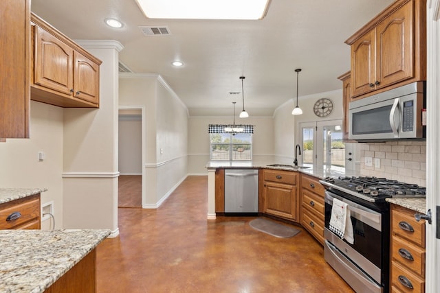 2000 County Road 116b, Burnet, TX 78611 - kitchen featuring appliances with stainless steel finishes, a sink, a peninsula, backsplash, and concrete flooring
