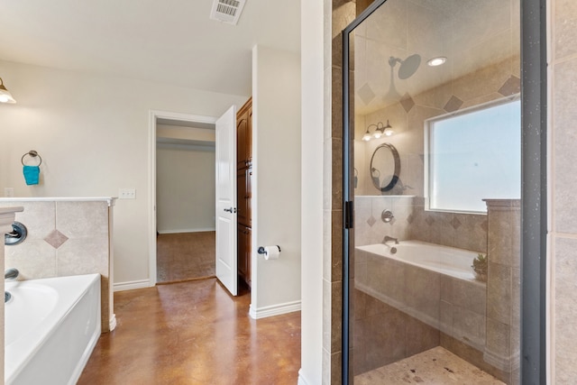 bathroom featuring independent shower and bath and concrete flooring