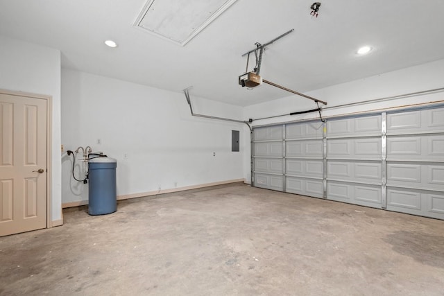 garage featuring electric panel and a garage door opener