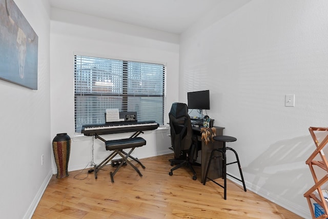 2502 Leon St Unit 211, Austin, TX 78705 - home office featuring wood finished floors and baseboards