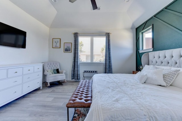 bedroom with ceiling fan and light hardwood / wood-style flooring