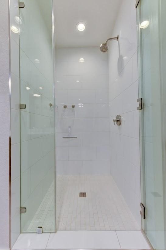 bathroom featuring walk in shower