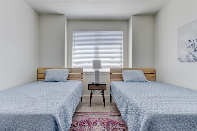 bedroom featuring hardwood / wood-style flooring