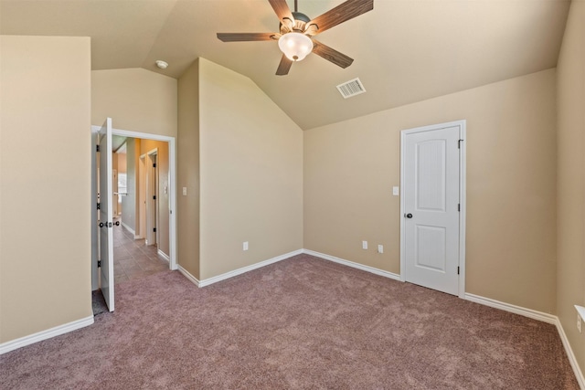 bonus room with ceiling fan, light colored carpet, and vaulted ceiling