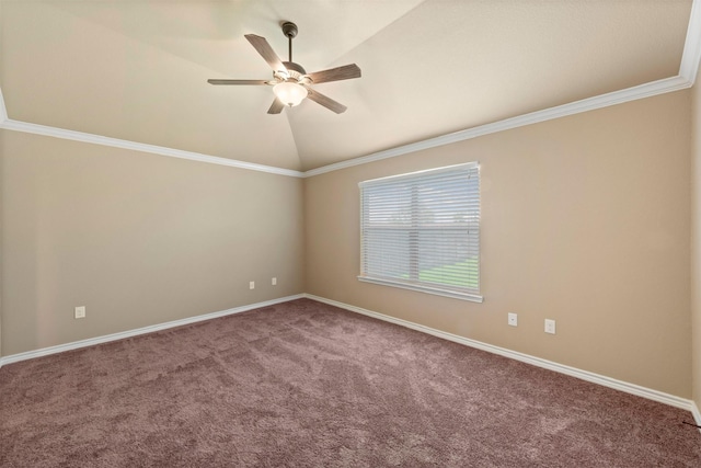 carpeted empty room featuring ceiling fan, ornamental molding, and vaulted ceiling