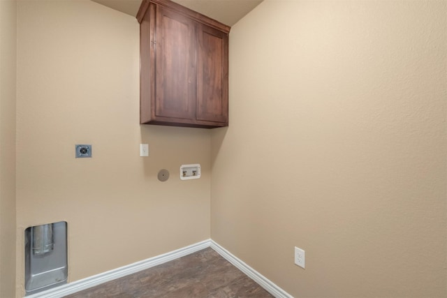 laundry area featuring washer hookup, electric dryer hookup, and cabinets