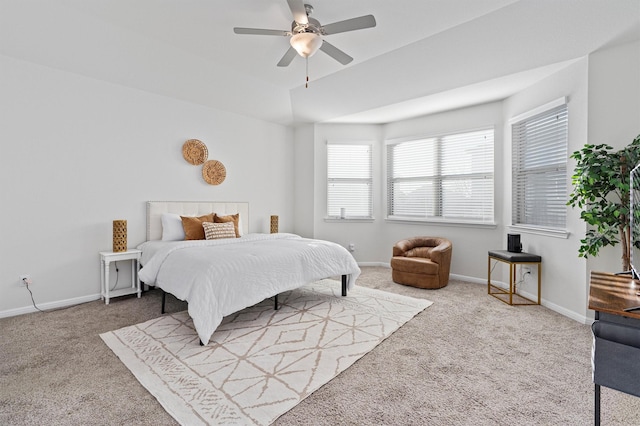 bedroom with ceiling fan and carpet flooring