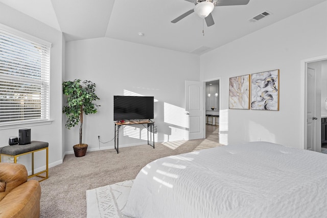 bedroom featuring light carpet, ceiling fan, and lofted ceiling