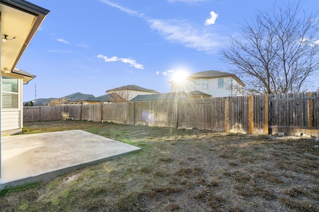 view of yard featuring a mountain view and a patio