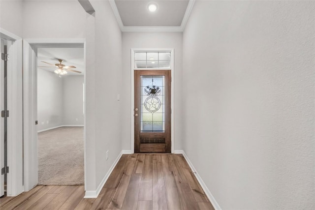 1207 Haley Ln, Salado, TX 76571 - foyer entrance with ornamental molding, wood finished floors, a ceiling fan, and recessed lighting