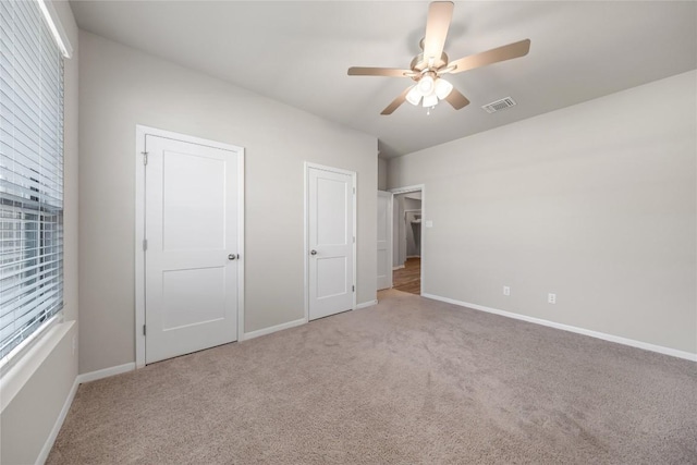 1207 Haley Ln, Salado, TX 76571 - unfurnished bedroom featuring carpet flooring and ceiling fan