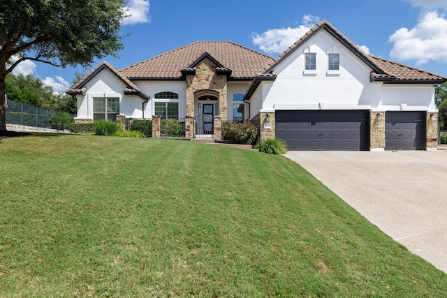 mediterranean / spanish-style home with a front yard