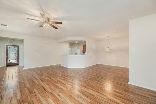 104 Honey Creek Trl, Georgetown, TX 78633 - unfurnished living room with light wood-type flooring, ceiling fan, baseboards, and recessed lighting