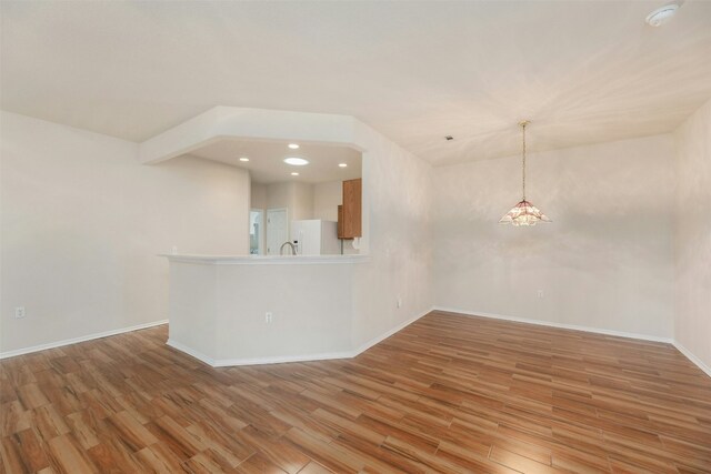 104 Honey Creek Trl, Georgetown, TX 78633 - unfurnished room featuring light wood-style floors, a smoke detector, baseboards, recessed lighting, and a chandelier