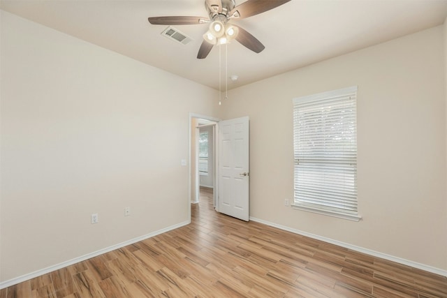 104 Honey Creek Trl, Georgetown, TX 78633 - unfurnished room with light wood-type flooring, baseboards, and a ceiling fan