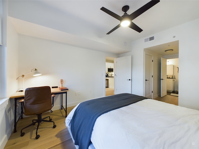 bedroom featuring ceiling fan and light hardwood / wood-style floors