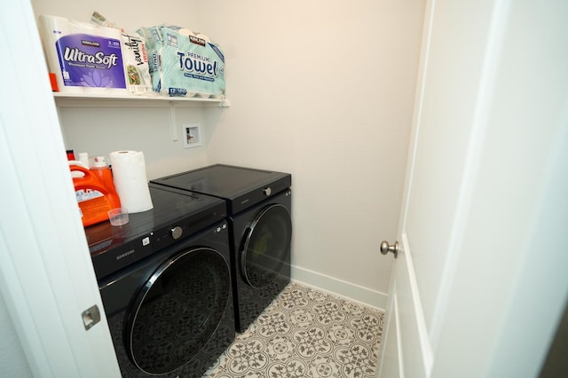 washroom featuring independent washer and dryer and tile patterned flooring