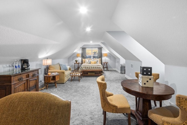 sitting room with carpet and lofted ceiling