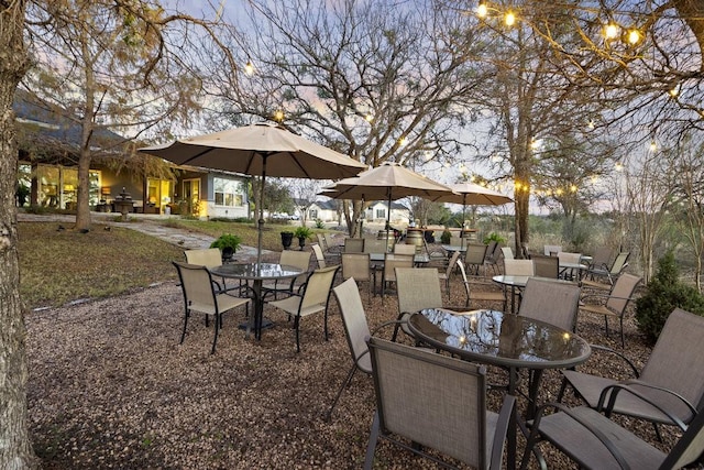 view of patio terrace at dusk