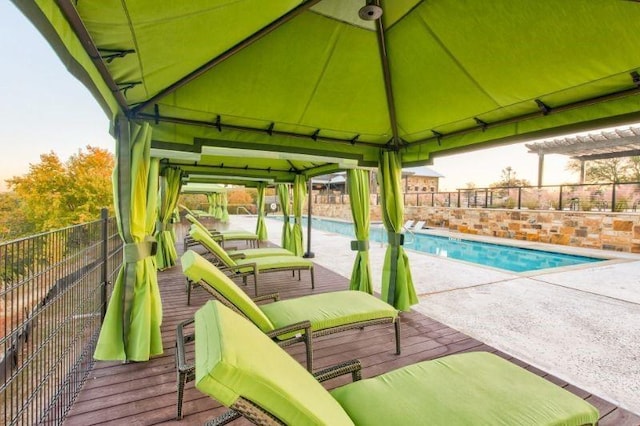 view of swimming pool featuring a gazebo