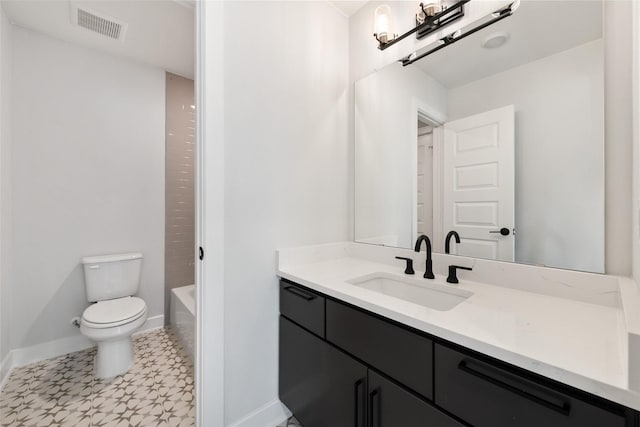 full bathroom with toilet, bathing tub / shower combination, and vanity