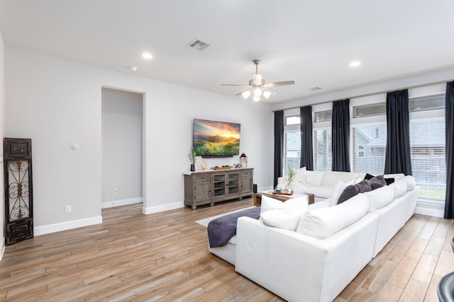 2131 Thayer Cv, San Antonio, TX 78253 - living area featuring light wood-type flooring, a ceiling fan, and recessed lighting