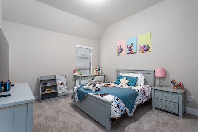 carpeted bedroom featuring vaulted ceiling