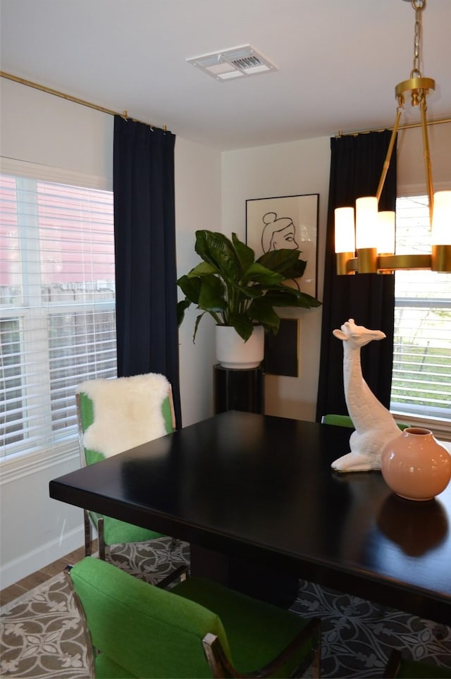 dining space featuring hardwood / wood-style flooring