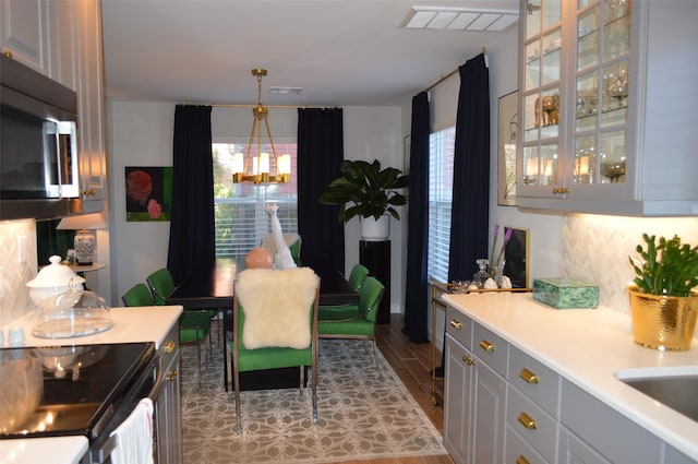 dining area featuring light hardwood / wood-style floors and sink