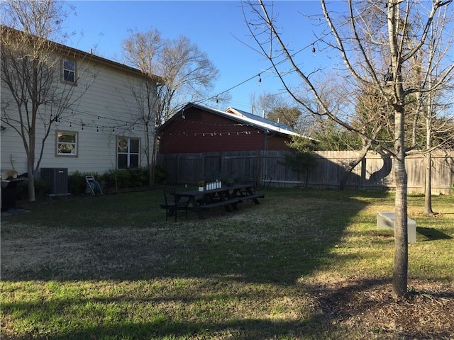 view of yard with central AC